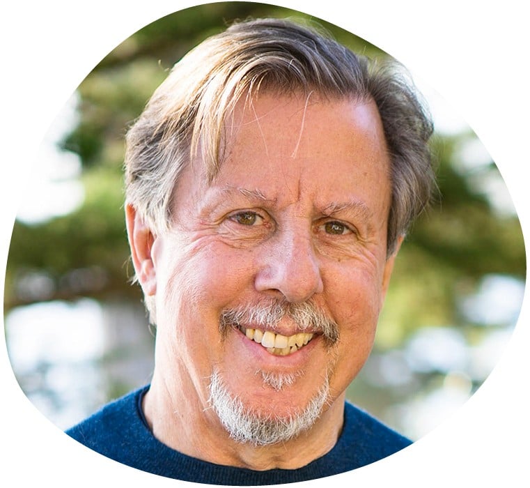 Headshot of Dick Schwarts wearing a blue sweater